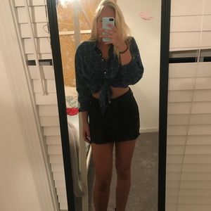 Distressed black mini skirt